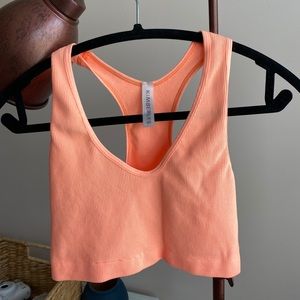 Kimberly bright orange ribbed razor back tank top. Size Medium, very stretchy